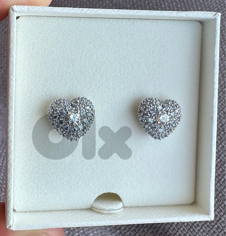 Swarovski PE STUDS PE BLU/RHS earings  5683576 with guarantee.