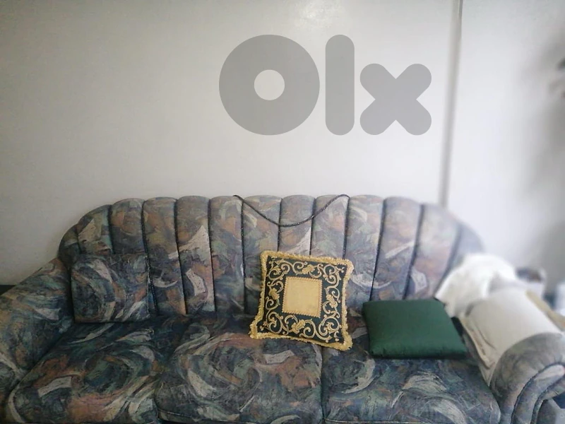 set of sofas and tables