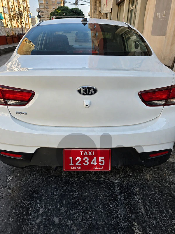 car with taxi plate