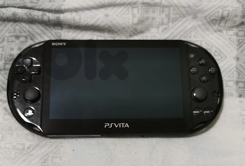 PS Vita Excellent Condition + Rare Sly Cooper Bundle PS Vita Excellent Condition + Rare Sly Cooper Bundle