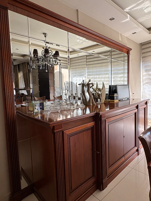 dinning room and a chandelier ..غرفة  سفرة وثريا