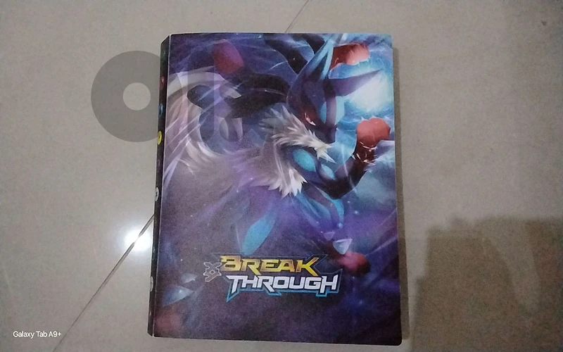 Pokémon book filled with german cards