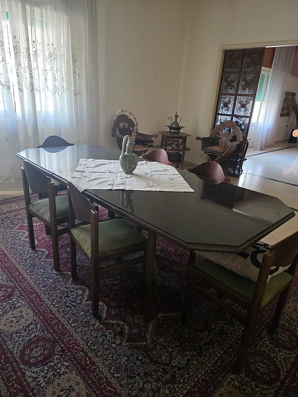 Elegant classic dining room set in rich dark wood