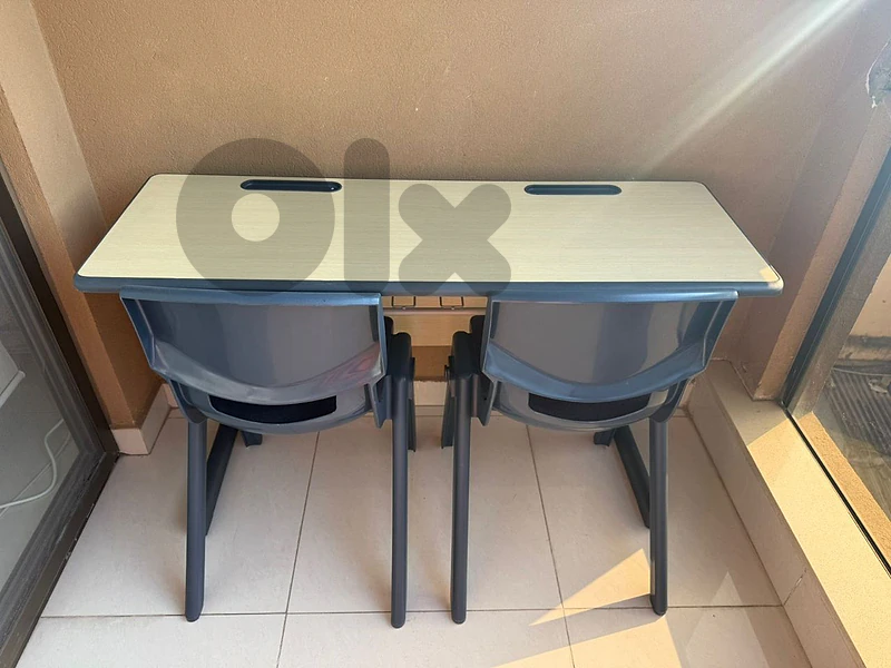 2 desks with 2 chairs each one