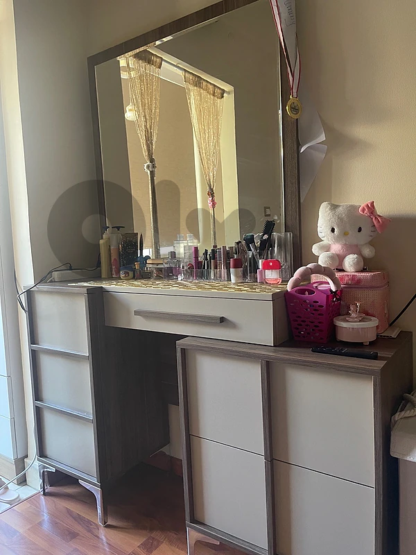 2 beds and a dresser