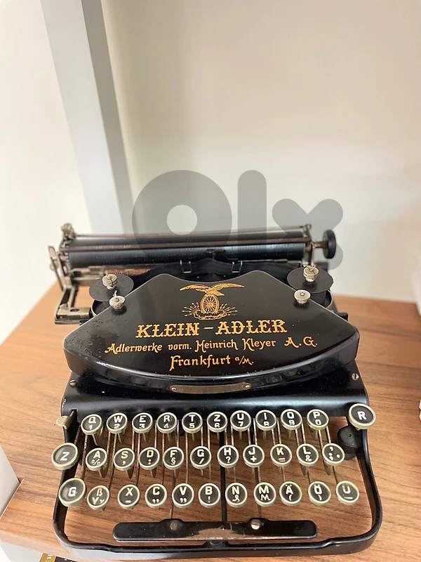 vintage black Klein-Adler typewriter (100+ years old)