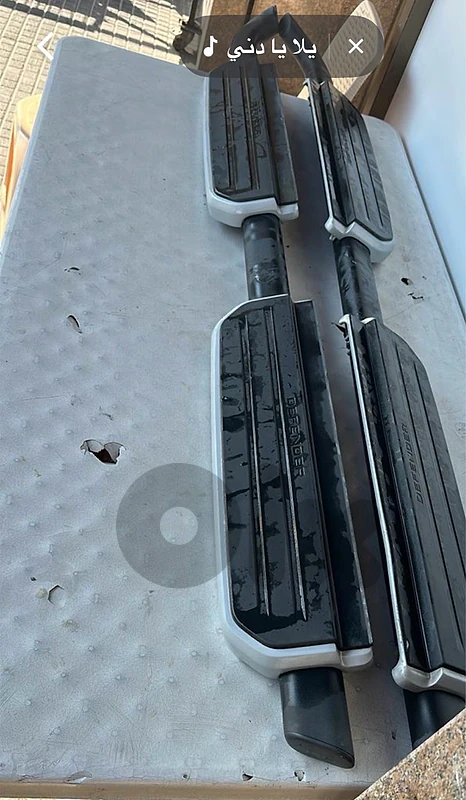 pair of automotive side steps (running boards)