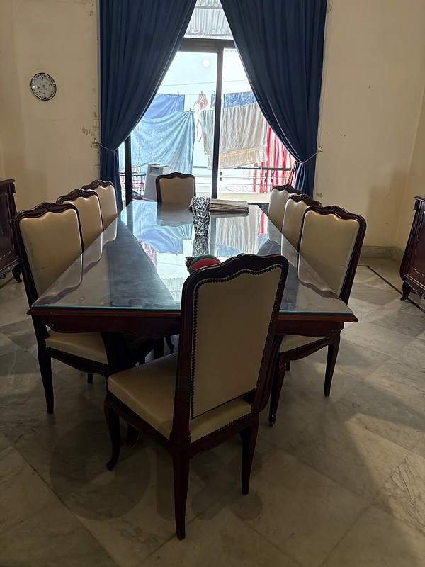 dining table with 12 chairs and 2 dressoir and 1 mirror