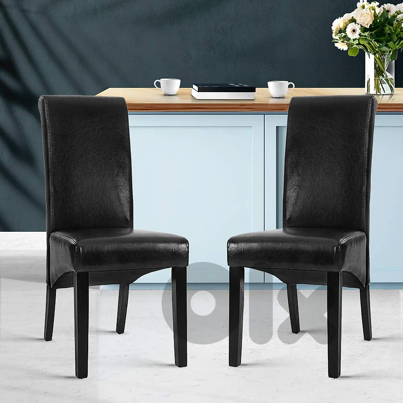 tectake® Set of 2 Dining Chairs with Faux Leather Covers. tectake® Set of 2 Dining Chairs with Faux Leather Covers.