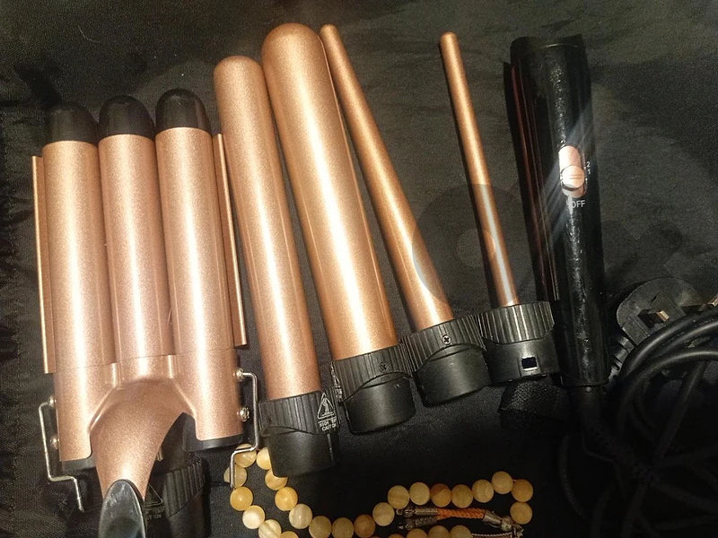 curling iron used like new very good condition bought from amazon