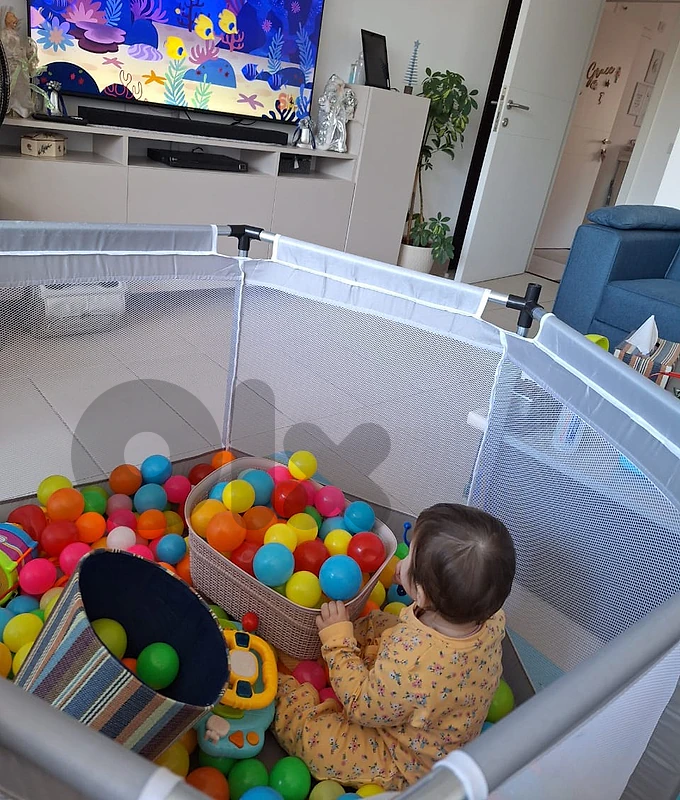 Playpen with basketball hoop and balls