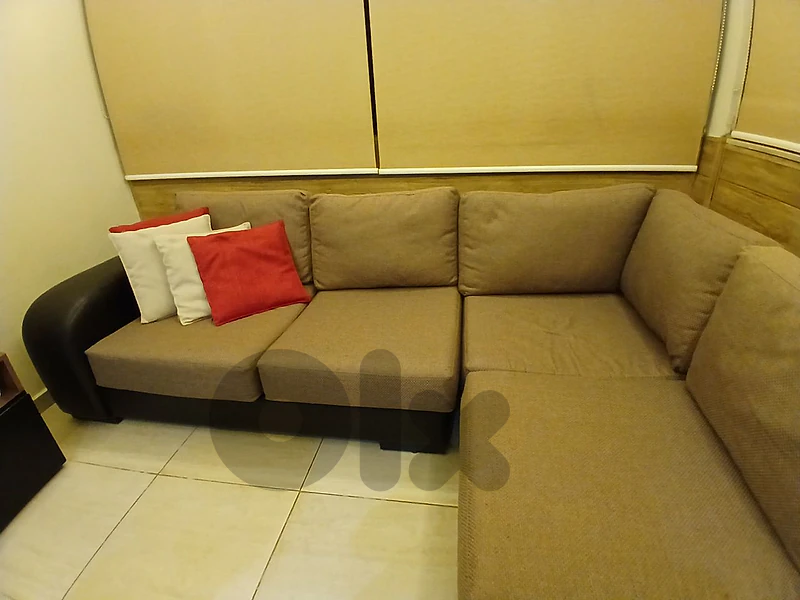 corner living room with tv unit