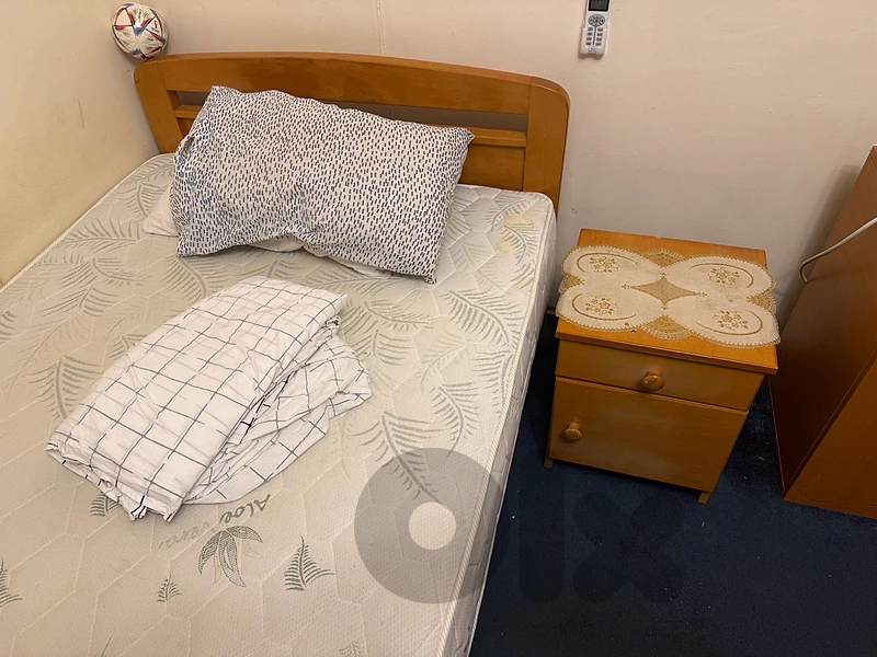 bed and mattress and nightstand