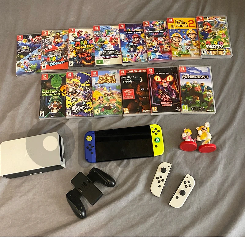 Nintendo Switch OLED Super Bundle! (450-500$) Nintendo Switch OLED Super Bundle! (450-500$)
