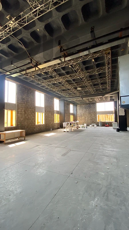 Rooftop with indoor industrial open space  nightclub or gym