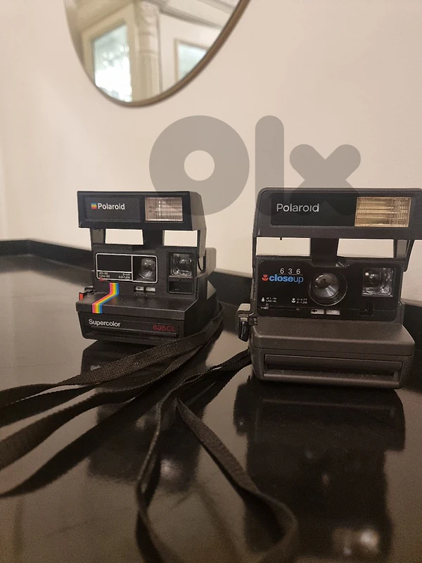 2 polariod cameras