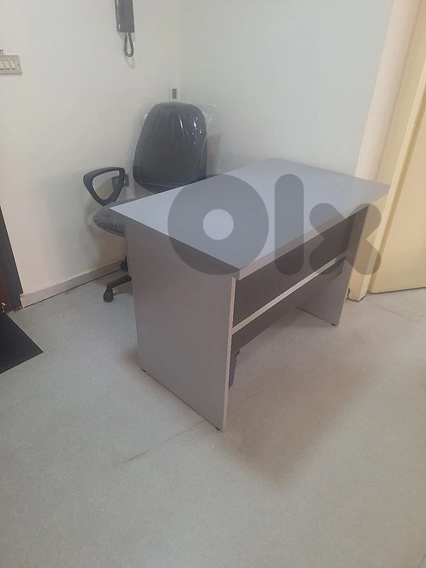 2 desk chair one used one new and two desk used but new condition