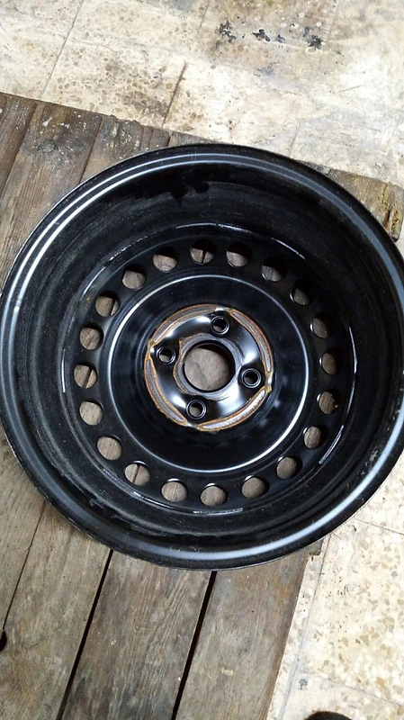 New iron rims 14 wiz covers