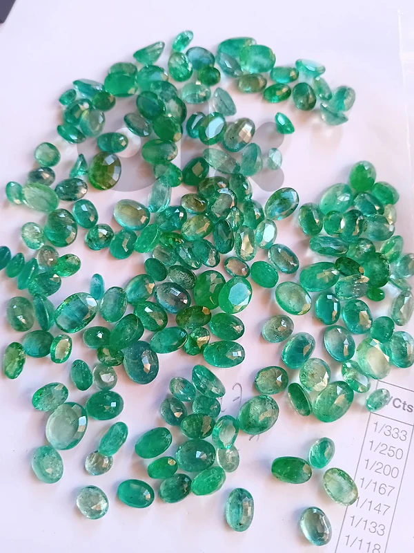 natural emerald 500 ct. zambian  20000$ total. 500 ct