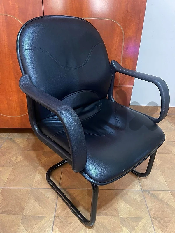 Black leather chair in very good condition.