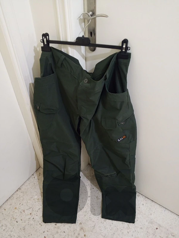 بنطلون رجالي للبيع لون زيتي شبه جديد قياس XXL السعر 35$