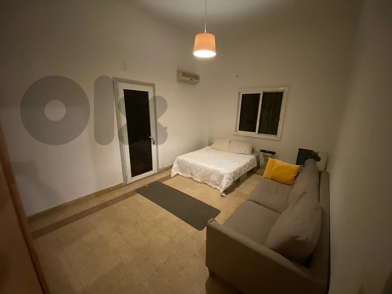 Spacious room in a shared flat near Al Room hospital
