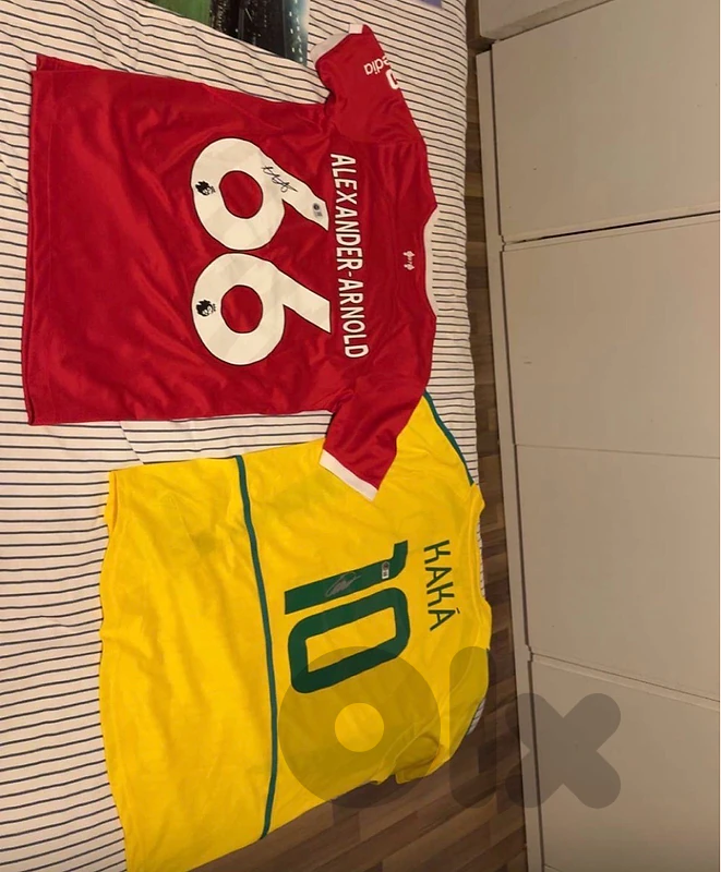 KAKA BRAZIL AND TRENT LIVERPOOL SIGNED JERSEYS.