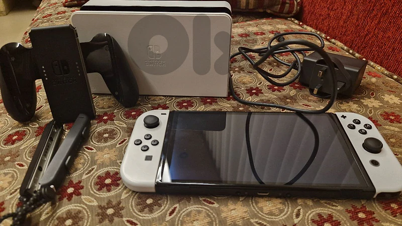 Nintendo Switch Oled (white) + Accessories Good condition Nintendo Switch Oled (white) + Accessories Good condition