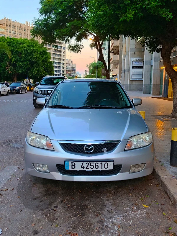 Mazda 323 2003 last version