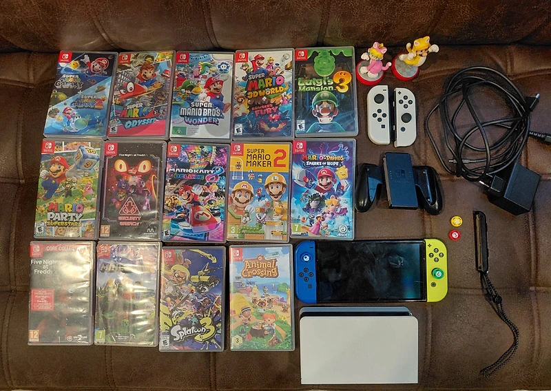 Switch OLED with 14 Games + Extra Accessories