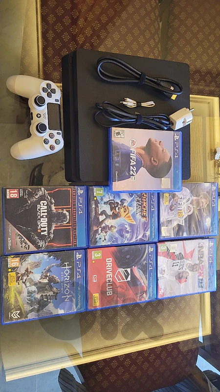 clean ps4 + controller + 7 games