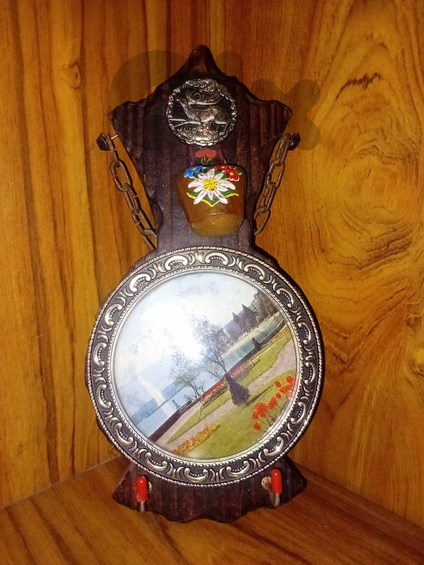 wood item hanging in wall