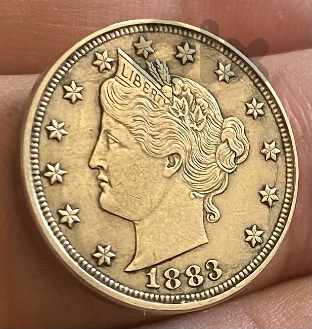 عملة ٥ سنت ١٨٨٣ V nickel الحرية اول اصدار سنة ١٨٨٣ بدون كلمة Cents
