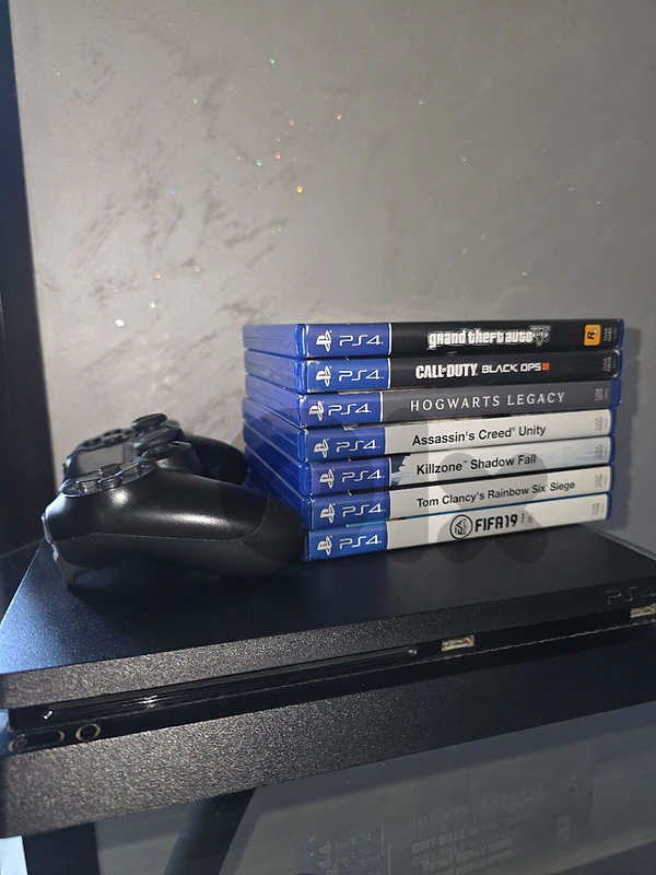 Ps4 slim + 1 controller+ 7games Ps4 slim + 1 controller+ 7games