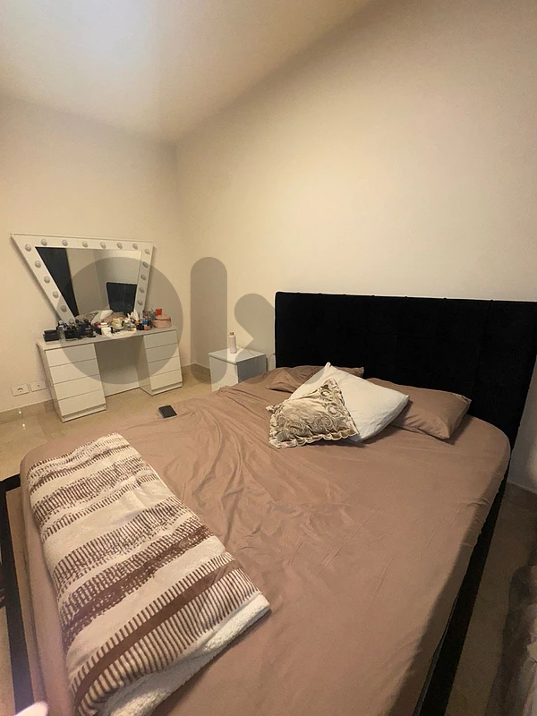 full bedroom available for sale with a dressing room