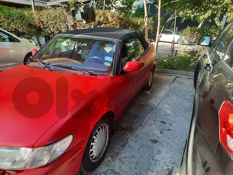 A very unique Red Saab Convertible for sale (the only red )