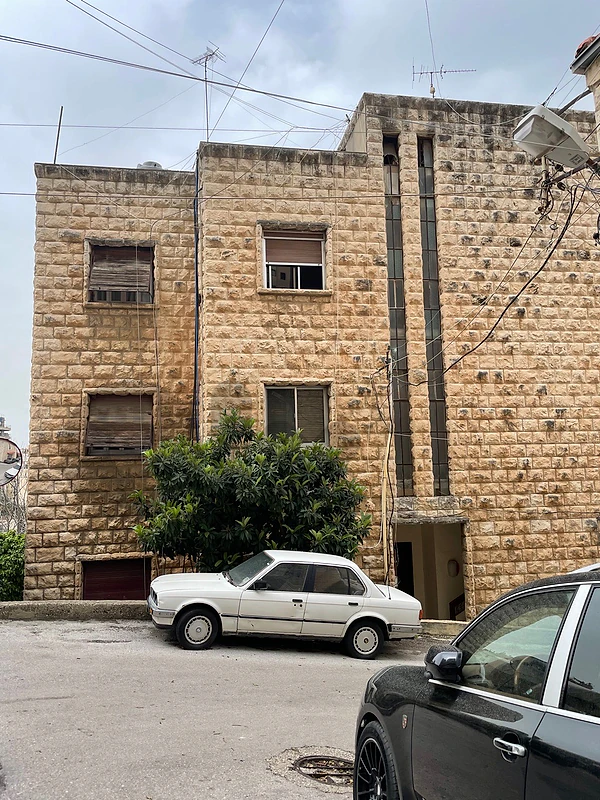 Building for sale in Ghadir, near the highway