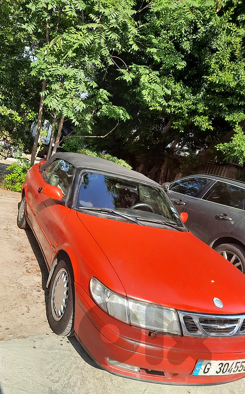A very unique Red Saab Convertible for sale (the only red )