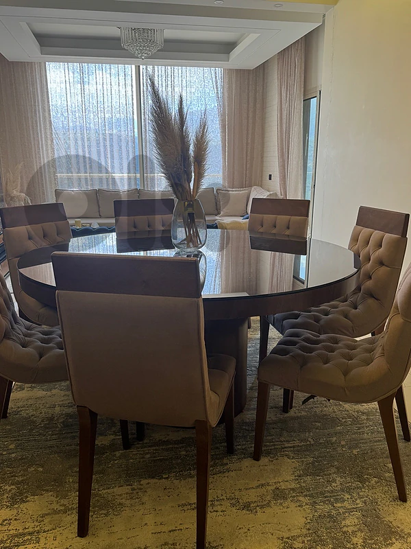 Dining Table and 8 Chairs طاولة سفرة مع ق كراسي