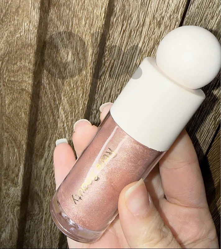 rare beauty blush topper (highliter)