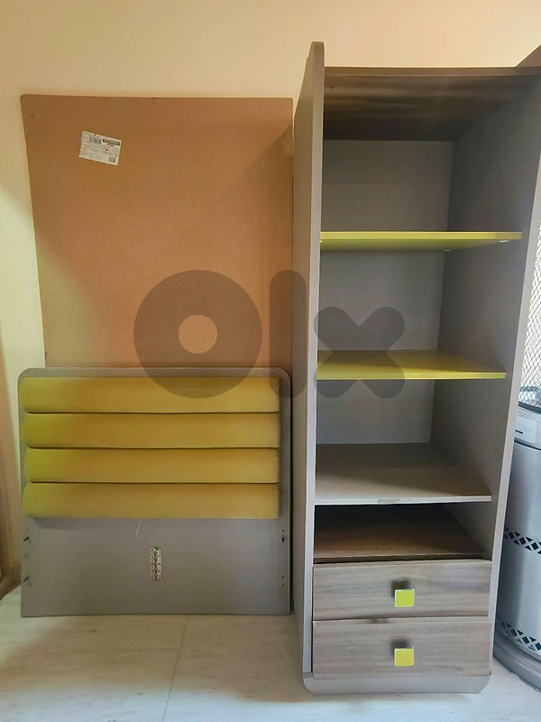 one single bed and shelving unit