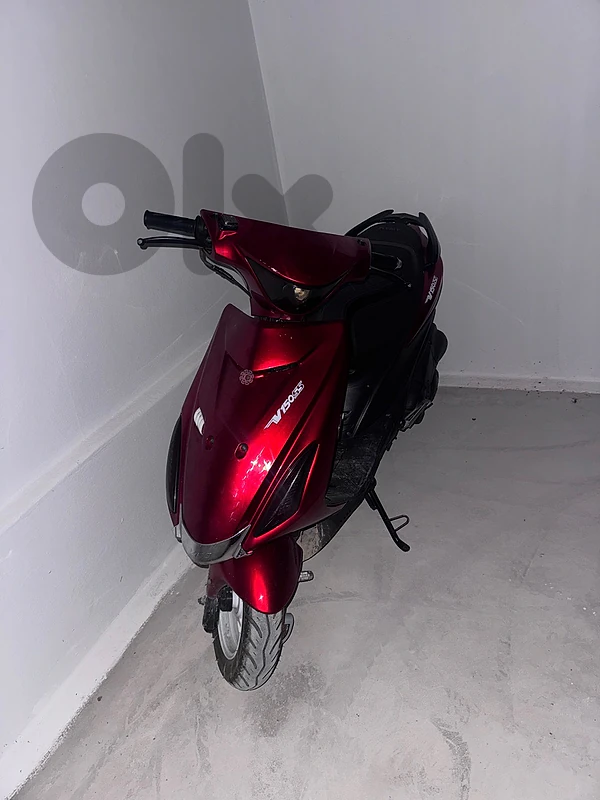 V150cc لون خمري بحالة ممتازة