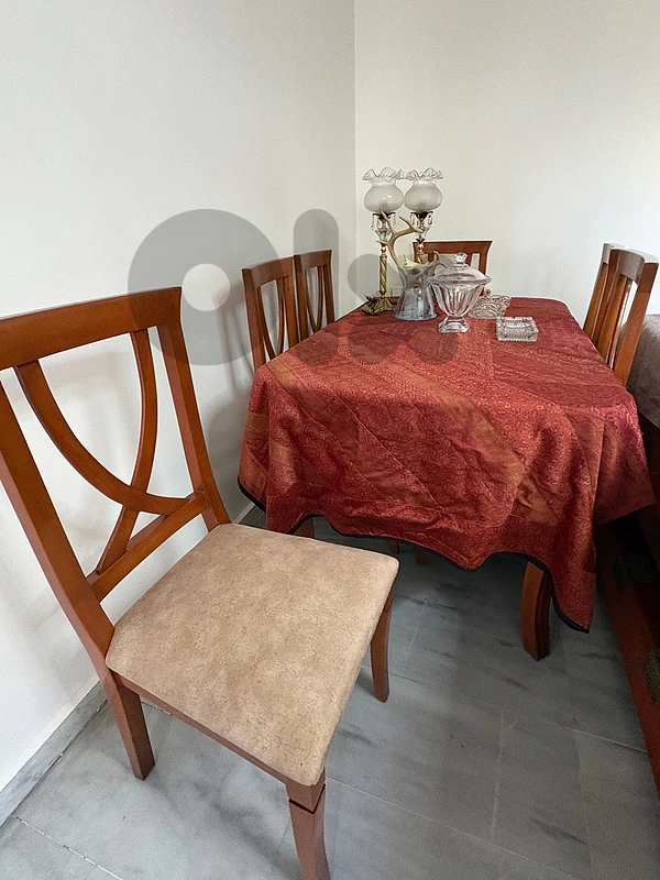 Wooden Dining Table with 6 Chairs – Good Condition