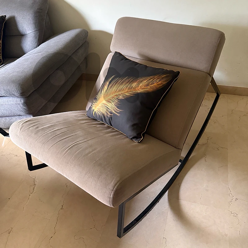 rocking chair in light grey colour