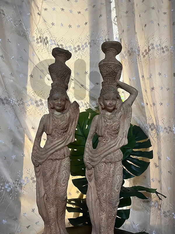 vintage Balinese-style hand-carved stone sculptures