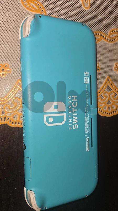 nintendo switch lite teal (broken)