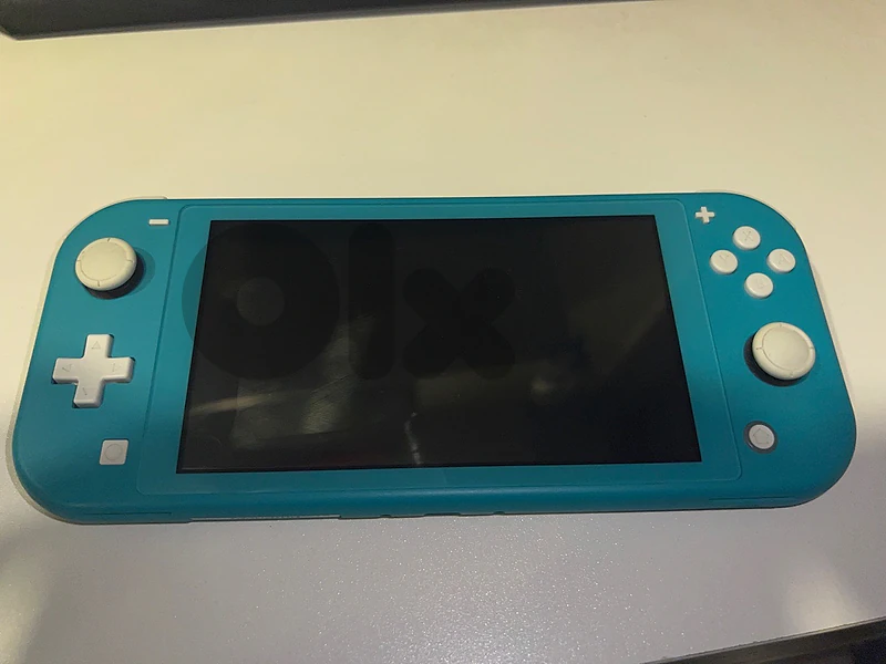 Nintendo Switch lite cyan (used)