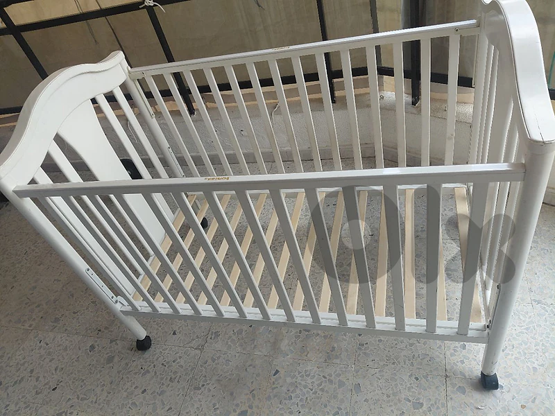 white wooden baby crib .. look as new