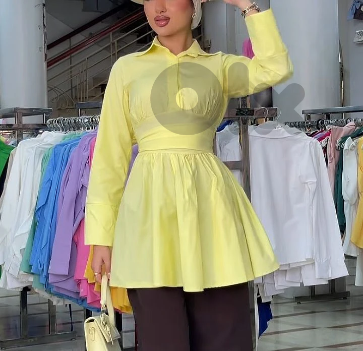 Yellow Women’s Top = قميص نسائي أصفر.