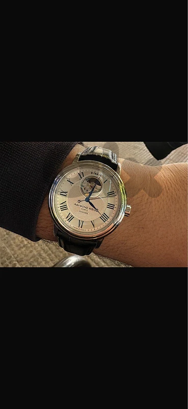 very clean raymond weil swiss made last 700$